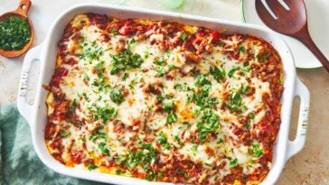 1. A delicious chicken parmesan casserole topped with melted cheese and herbs, served in a baking dishground mince recipes