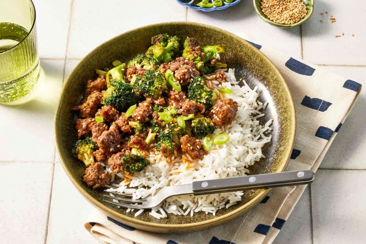 A bowl filled with rice, tender meat, and vibrant broccoli, creating a colorful and appetizing meal ideas with ground beef for dinner