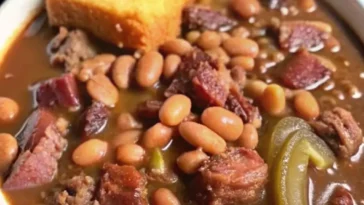 Pinto beans ham hocks cornbread and pickled onions